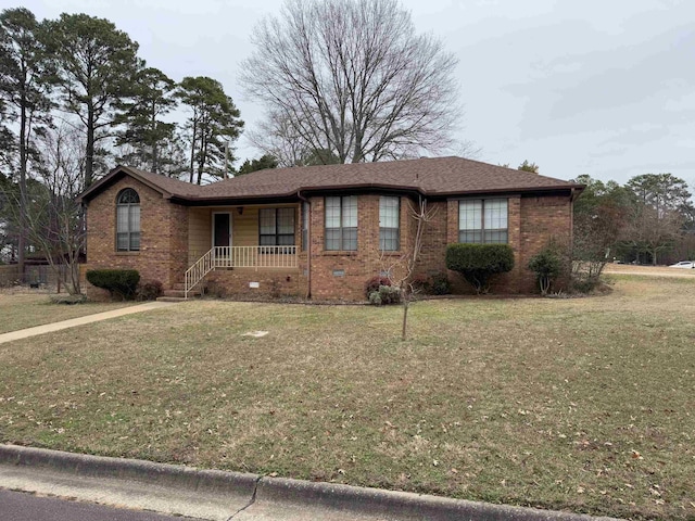 single story home with covered porch and a front lawn