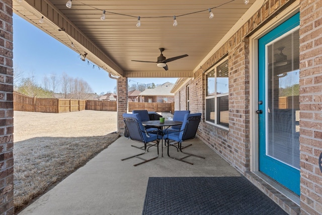 view of patio featuring ceiling fan