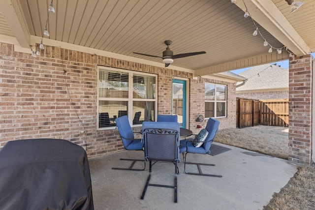 view of patio with grilling area and ceiling fan