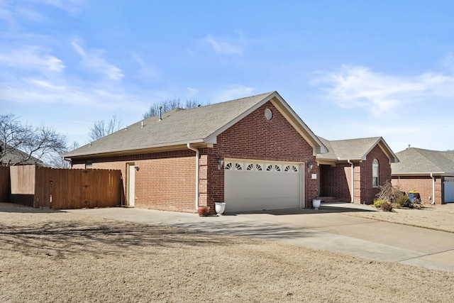 ranch-style home with a garage