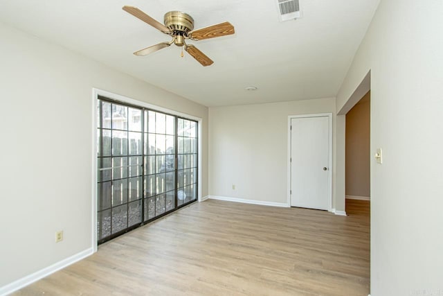 unfurnished room with ceiling fan and light hardwood / wood-style floors