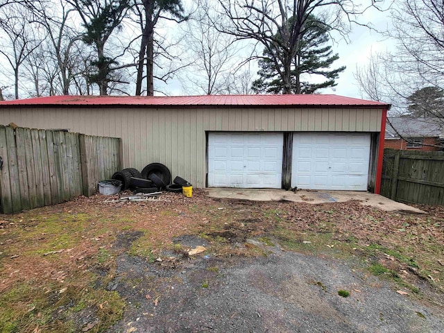 detached garage with fence