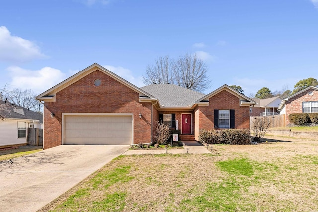 view of front of property with a front lawn and a garage