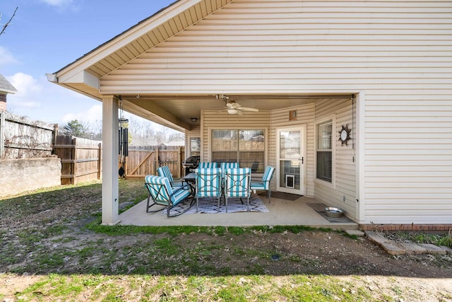 view of patio featuring ceiling fan