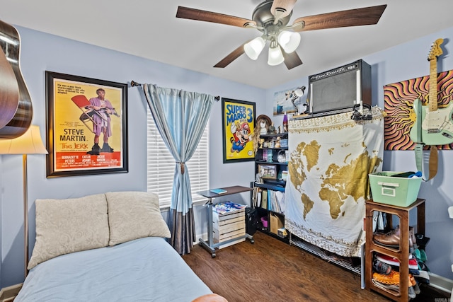 bedroom featuring dark hardwood / wood-style floors and ceiling fan