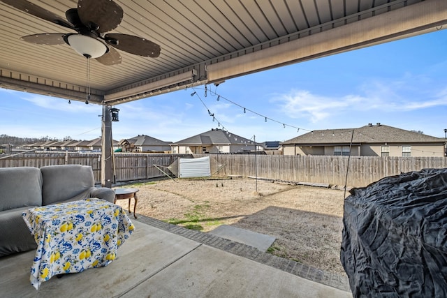 view of patio / terrace featuring ceiling fan