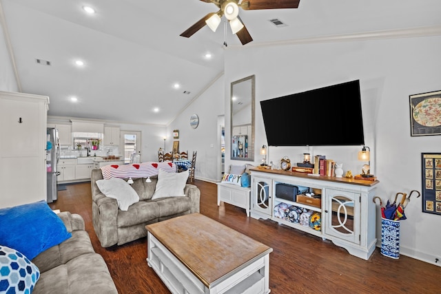 living room featuring ceiling fan, crown molding, dark wood-type flooring, and sink