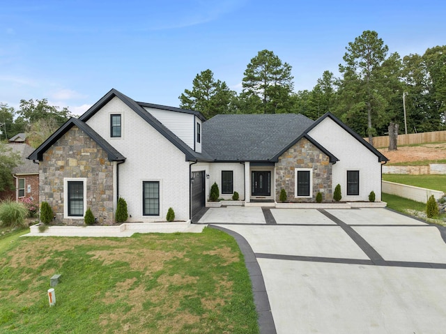 modern farmhouse with a front lawn