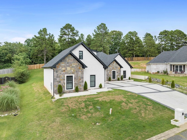 view of front of property with a front lawn