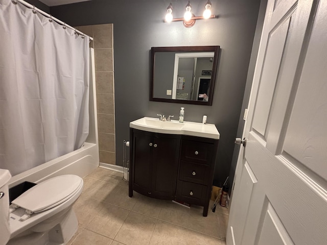 full bathroom with shower / tub combo with curtain, toilet, vanity, and tile patterned flooring