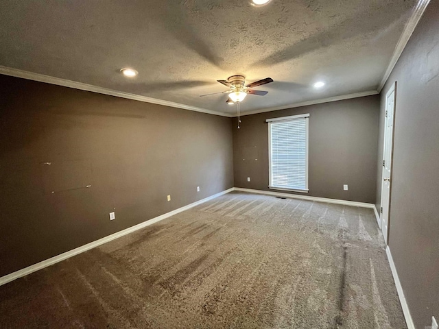 carpeted empty room featuring a textured ceiling, ceiling fan, and ornamental molding