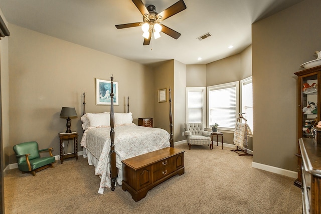 bedroom featuring ceiling fan and light colored carpet