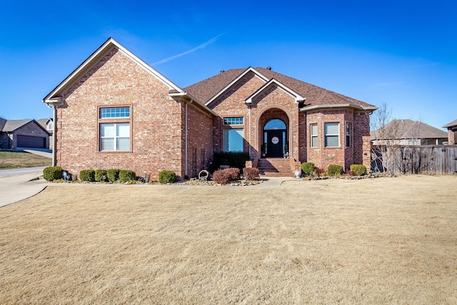 view of front of home with a front lawn