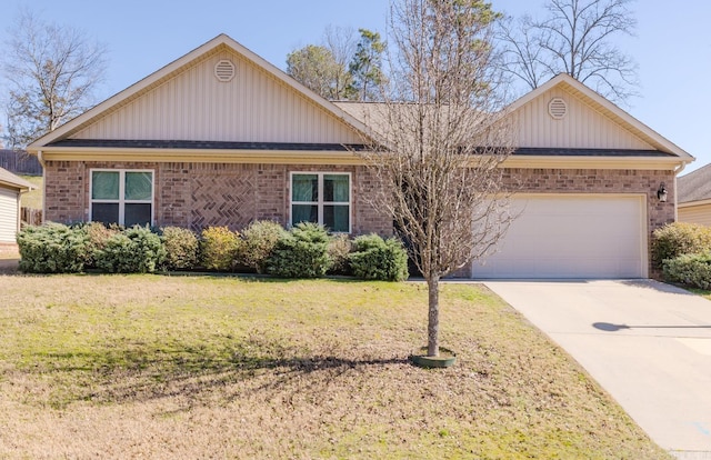 single story home featuring a front lawn and a garage