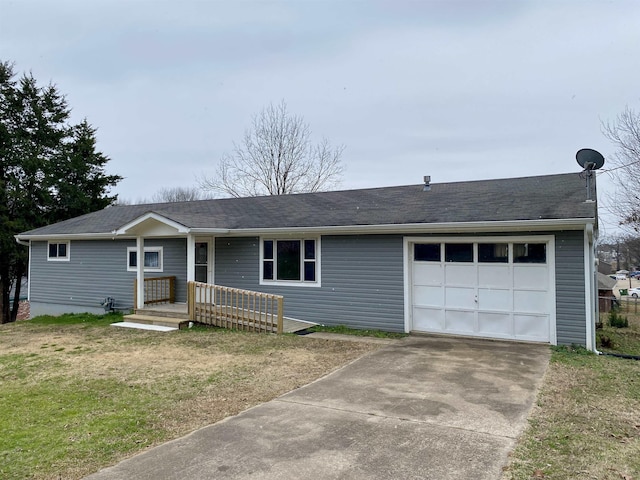 ranch-style home with a front lawn and a garage