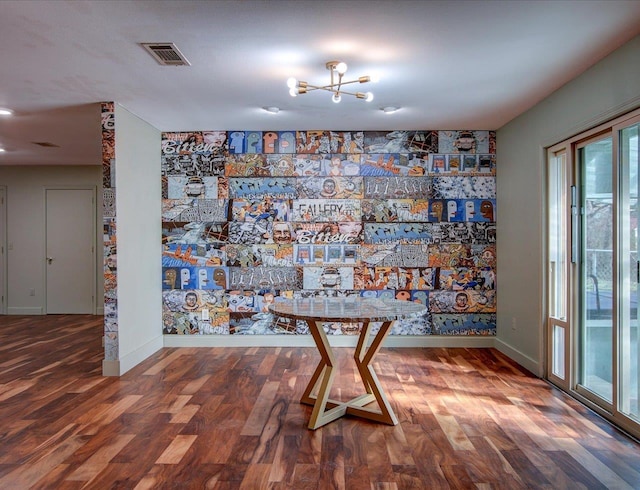 unfurnished dining area with hardwood / wood-style flooring