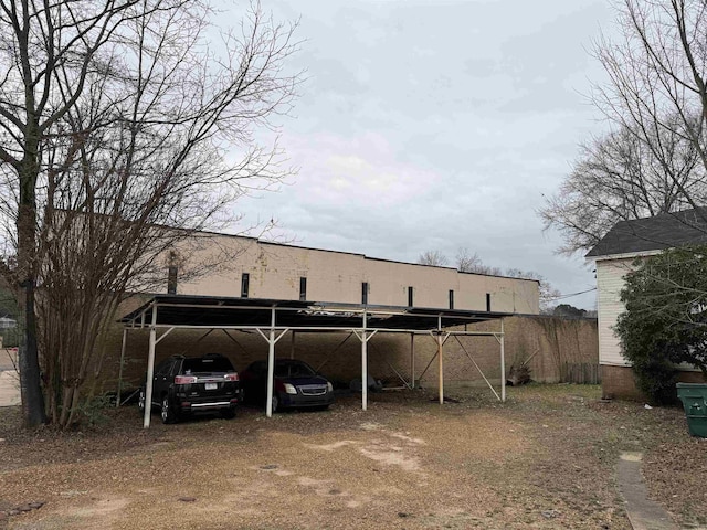 view of car parking with a carport