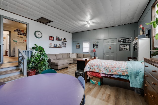 bedroom with light hardwood / wood-style floors