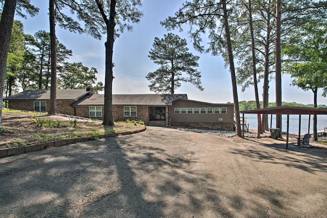 single story home with a water view