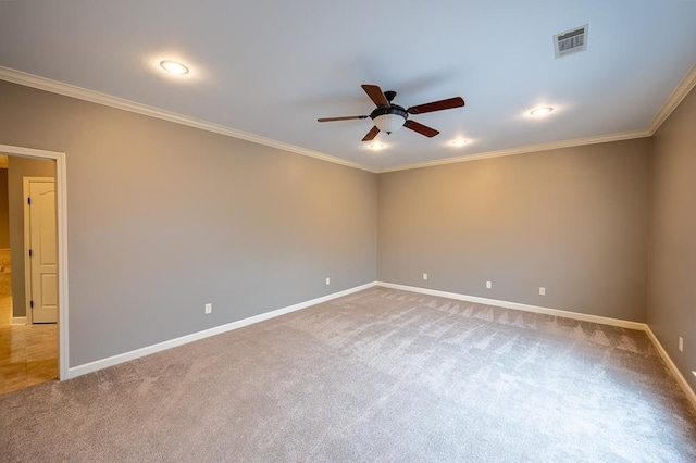 unfurnished room with ceiling fan, ornamental molding, and light carpet