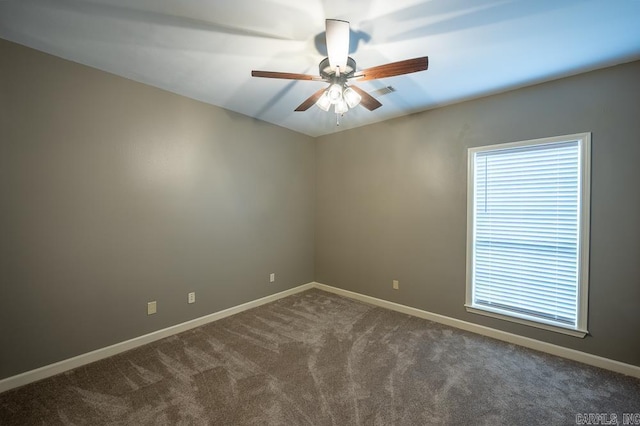 carpeted empty room with ceiling fan