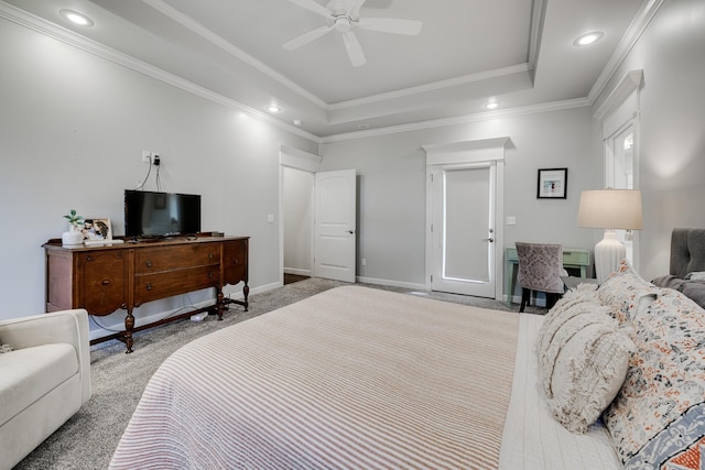 bedroom featuring recessed lighting, light carpet, baseboards, ornamental molding, and a raised ceiling