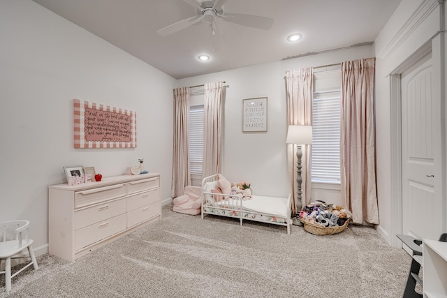 carpeted bedroom featuring recessed lighting, ceiling fan, and baseboards