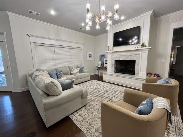 living area with a fireplace, visible vents, dark wood-type flooring, and ornamental molding