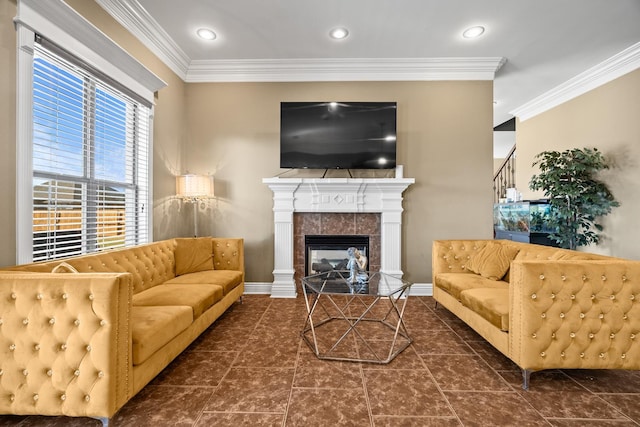 living room featuring a fireplace and ornamental molding