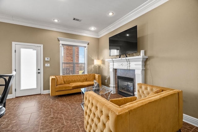 living room featuring crown molding