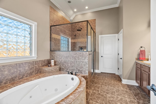 bathroom featuring shower with separate bathtub, vanity, and ornamental molding