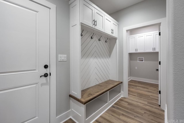 mudroom with light wood-type flooring