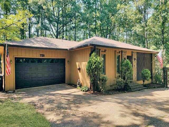 view of front of home with an attached garage and driveway