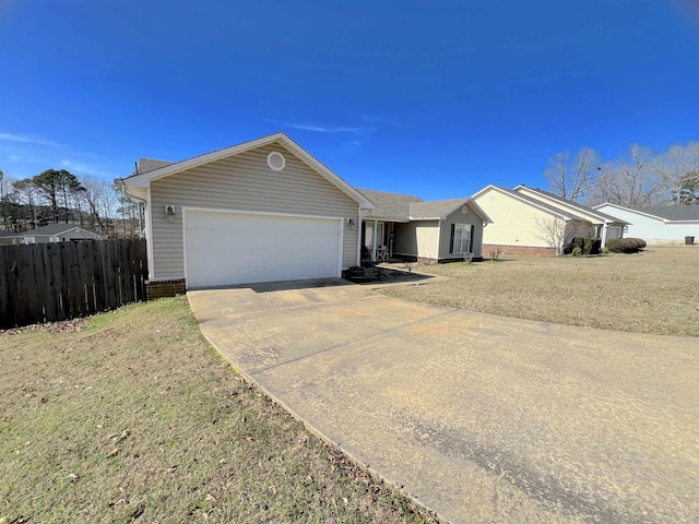 single story home with a front yard and a garage