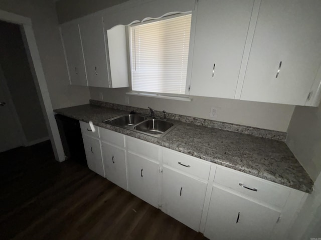 kitchen featuring sink, white cabinets, and dark hardwood / wood-style flooring