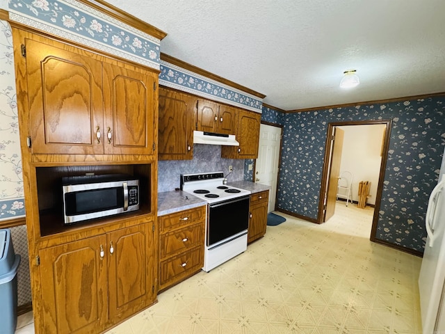 kitchen featuring a textured ceiling, white range with electric stovetop, and crown molding