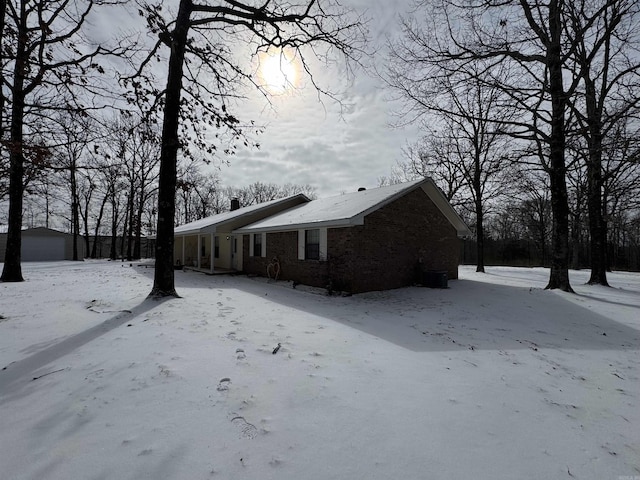 view of snow covered property