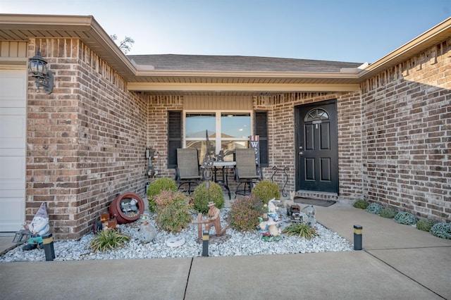 property entrance with a patio