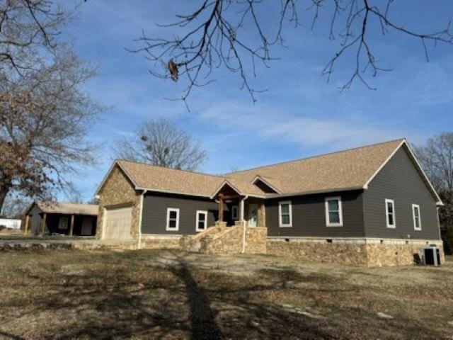 single story home featuring a garage