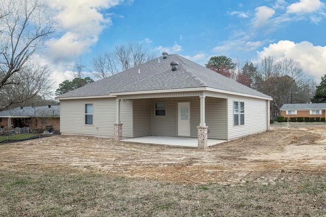 rear view of property with a patio area