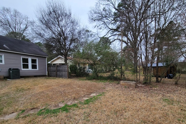 view of yard with central air condition unit