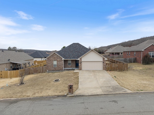 single story home featuring a garage