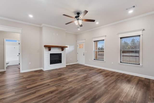 unfurnished living room featuring ceiling fan, dark hardwood / wood-style floors, and ornamental molding