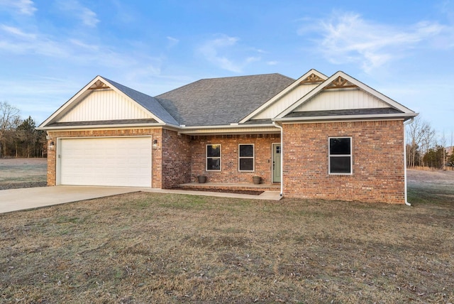 craftsman-style home featuring a front lawn and a garage