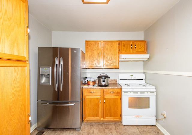 kitchen with under cabinet range hood, white range, baseboards, light countertops, and stainless steel fridge with ice dispenser