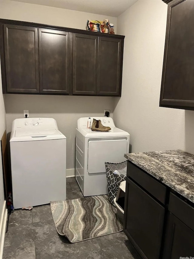 laundry area with cabinet space and washing machine and clothes dryer