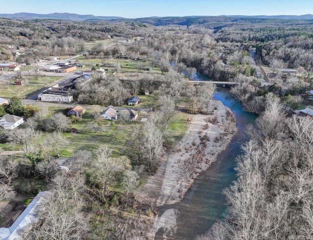 aerial view featuring a water and mountain view