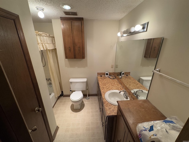 full bathroom featuring visible vents, toilet, vanity, a textured ceiling, and shower / bath combination with curtain