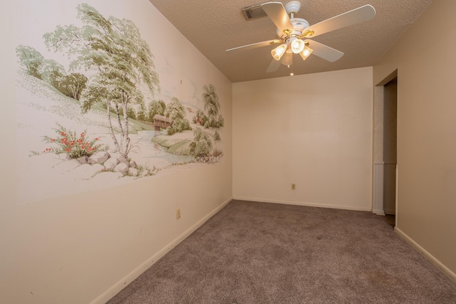 spare room with baseboards, visible vents, ceiling fan, a textured ceiling, and carpet flooring