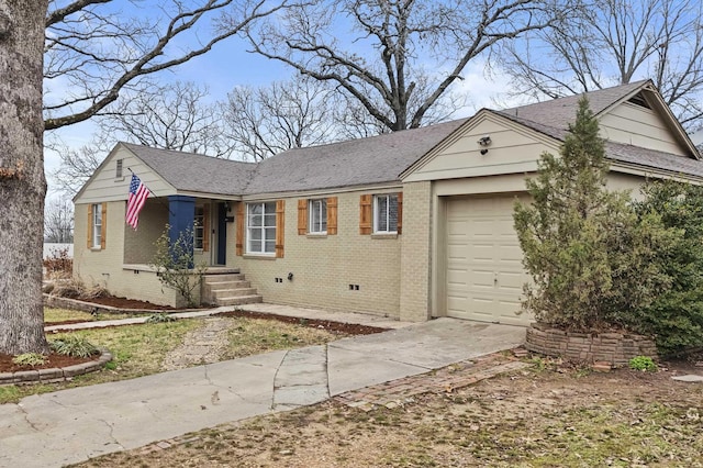 ranch-style house with driveway, roof with shingles, crawl space, an attached garage, and brick siding